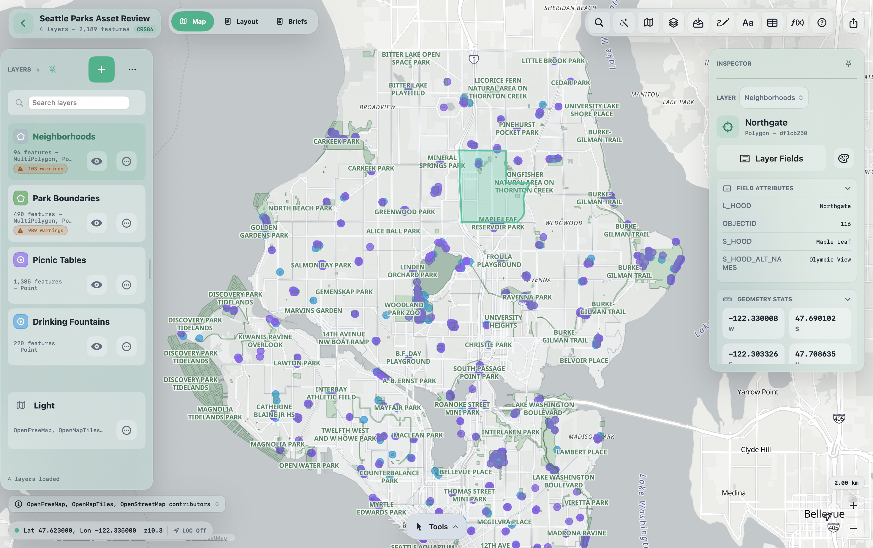 Meridian GIS on Mac with a Seattle parks spatial asset review open, showing neighbourhood and park layers, mapped assets, and feature attributes in the inspector.